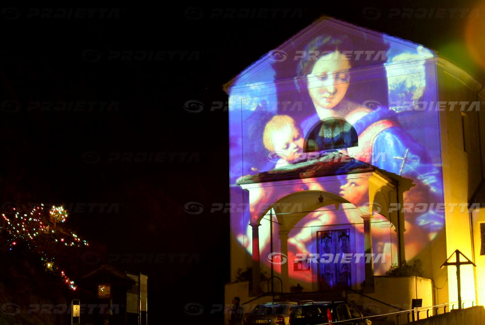 proiezione di grandi immagini in quadricromia per le lumonarie natalizie
